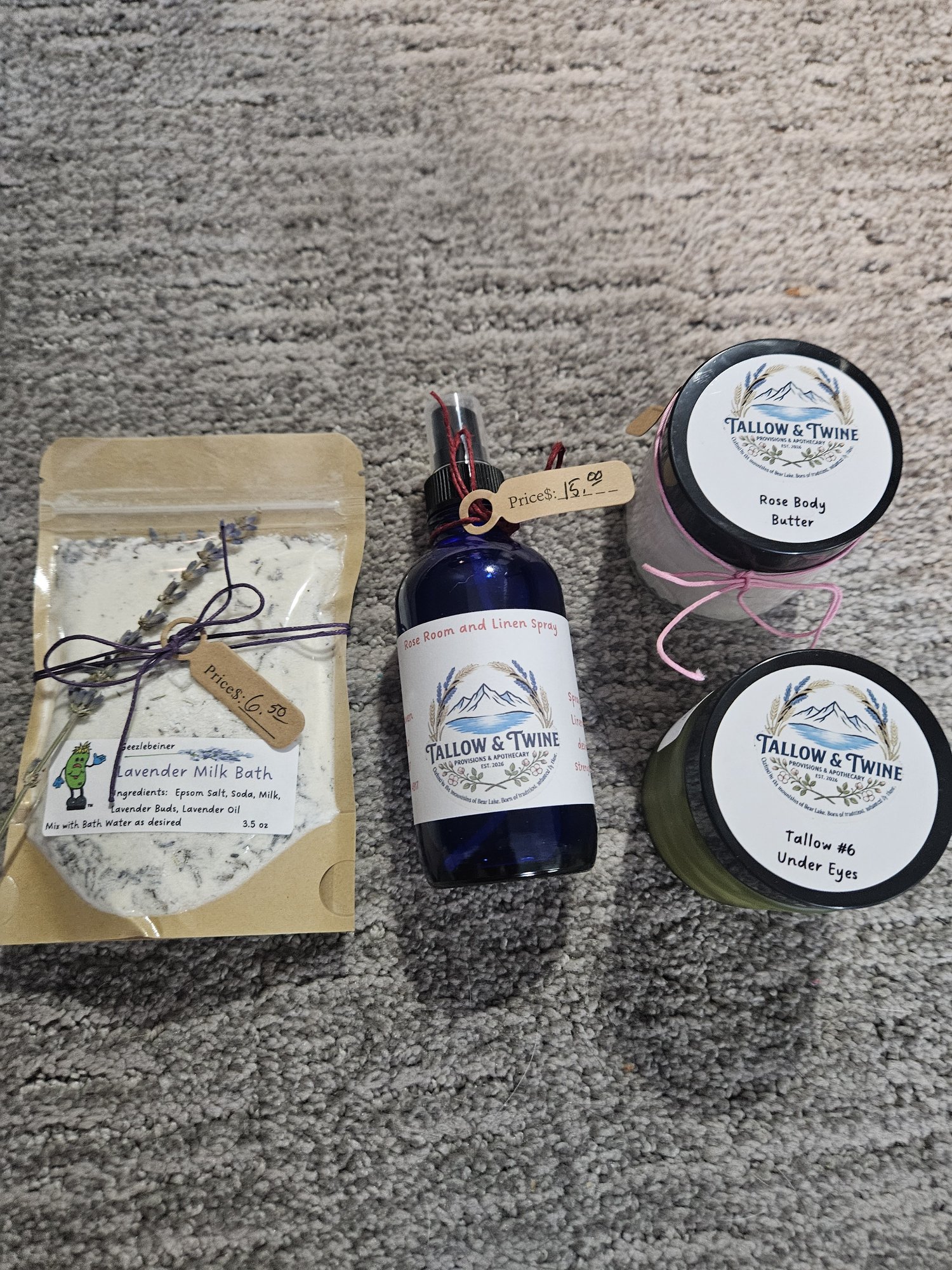 A Tallow & Twine gift pack: lavender milk bath, rose room and linen spray, rose body butter and tallow balm